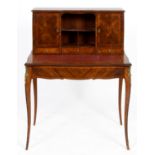 A French kingwood bonheur du jour, the superstructure with cupboards, a recess and drawers above a