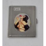 A silver cigarette case, initialled, later applied a plaque decorated a saucy lady Report by RB