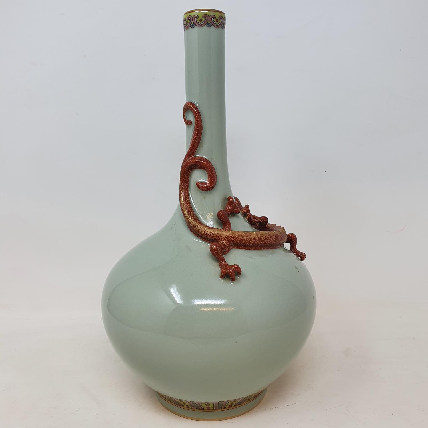 A Chinese celadon ground bottle vase, with a slender neck, applied a Chilong dragon with gilt - Image 2 of 7