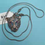 A silver, marcasite and ruby set panther necklace