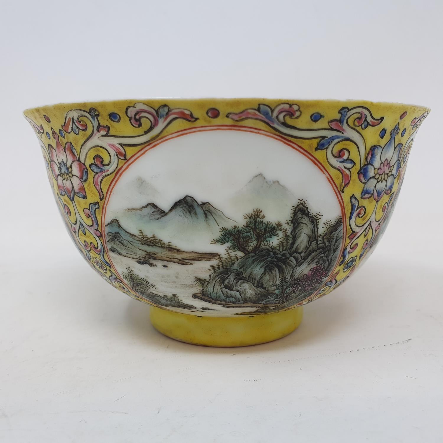 A Chinese porcelain medallion bowl, decorated vignettes of mountain scenes on a yelllow ground - Image 3 of 6