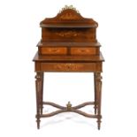 A French rosewood bonheur du jour, with brass mounts, the superstructure with a shelf and two