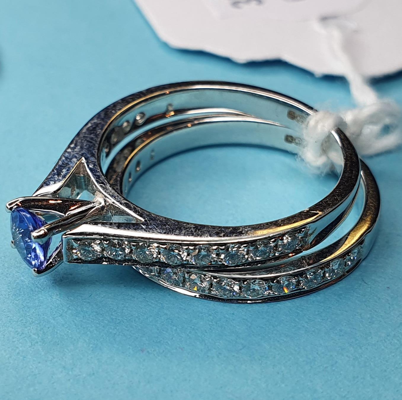 An 18ct white gold, diamond and tanzanite ring, and a matching eternity ring, both approx. ring size - Image 2 of 2