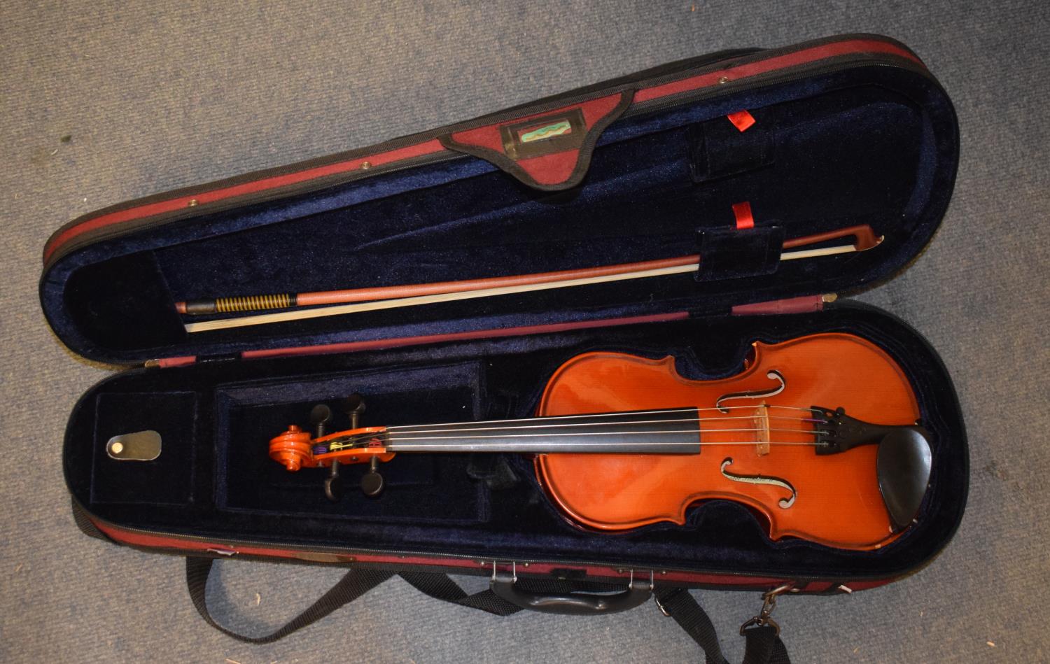 A Stentor Student Viola and a Stentor Student Violin, both in fitted cases (2)