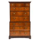 A 19th century walnut chest on chest, with three short drawers above three long drawers and three