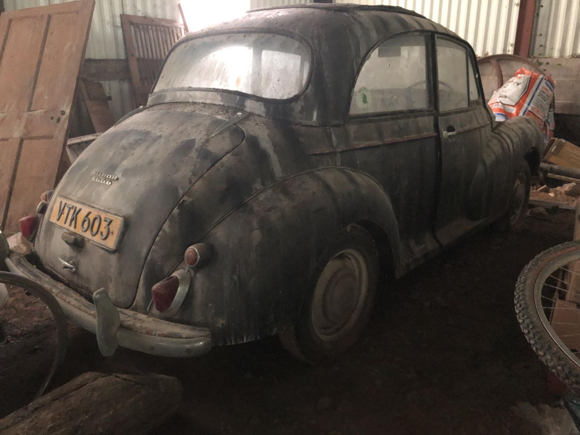 A 1961 Morris Minor two door saloon Registration number: VTK 603 V5 MOT exempt Black with a red