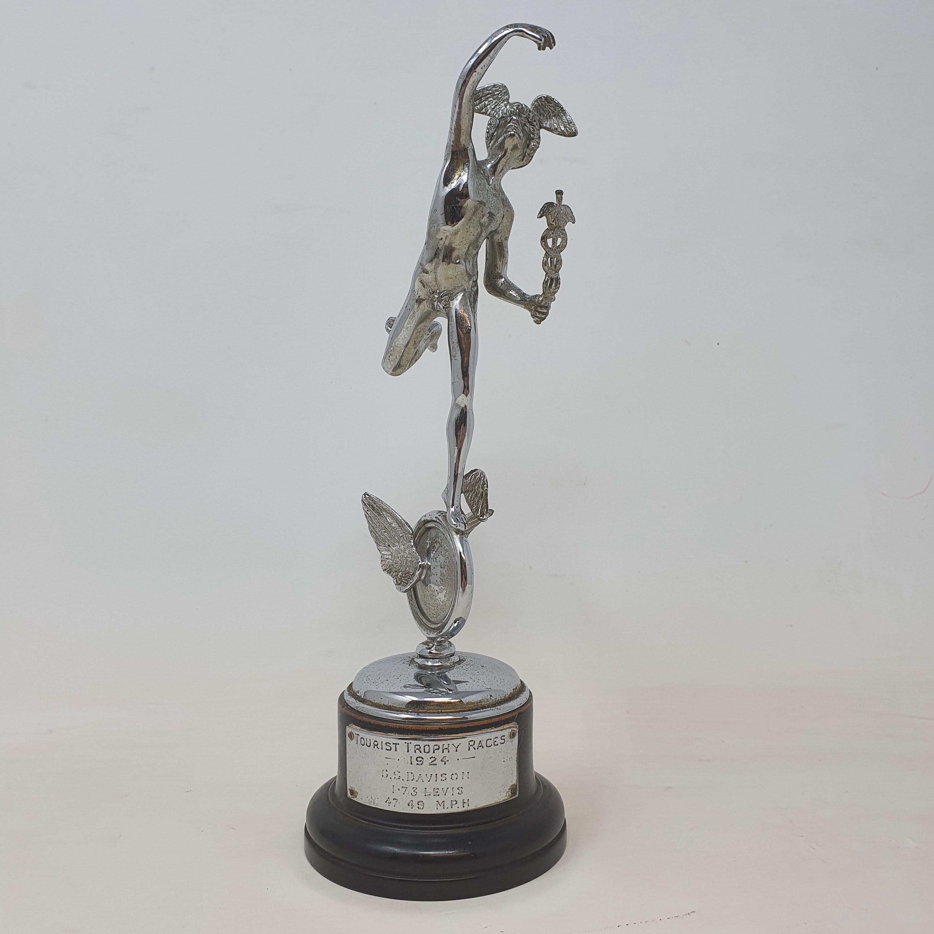 An Isle of Man TT silver replica trophy, 1924 award, mounted on a wooden plinth with applied