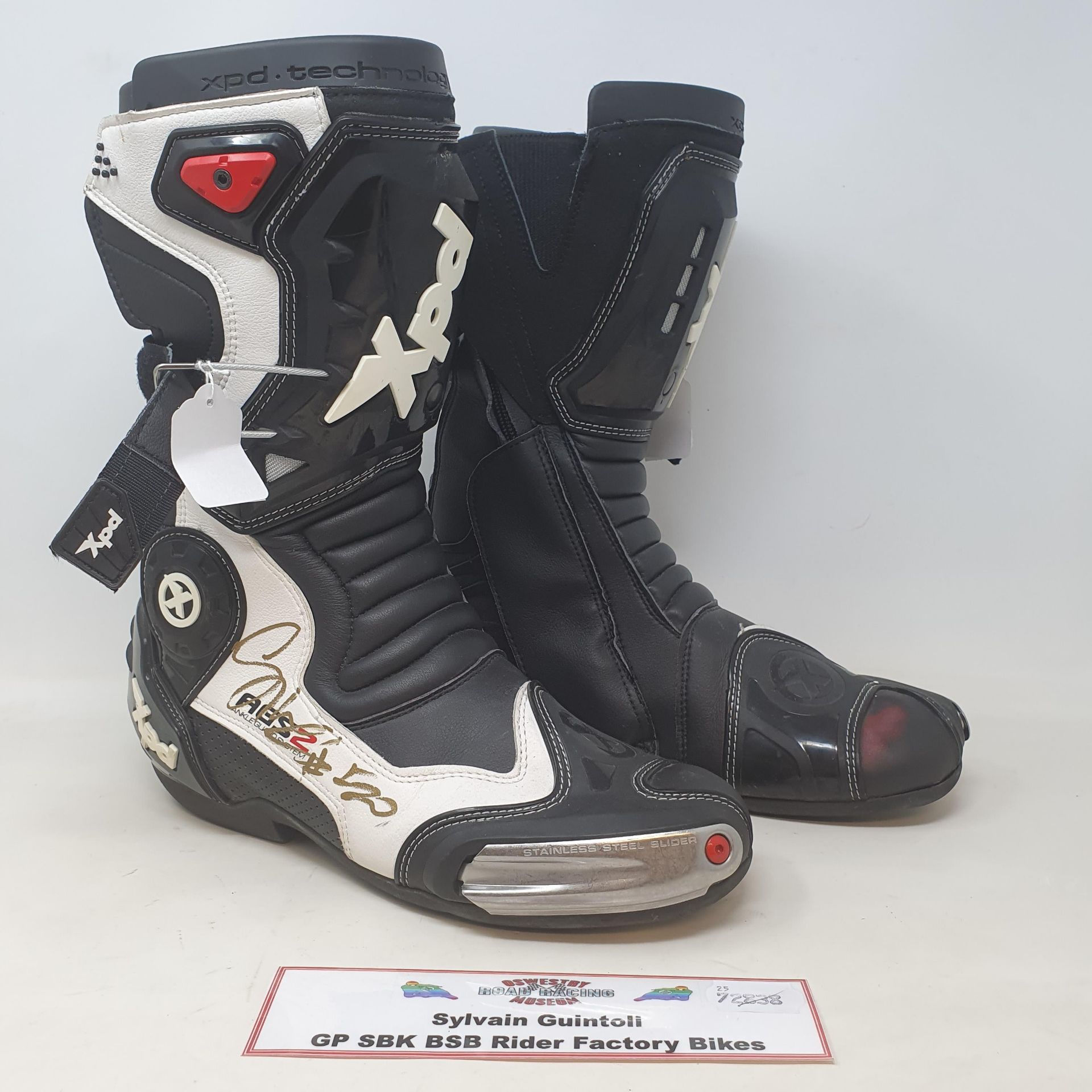 A pair of XPD motorcycle boots, as worn by Sylvain Guintoli GP, SBK, BSB competitor, signed (2) - Image 2 of 2