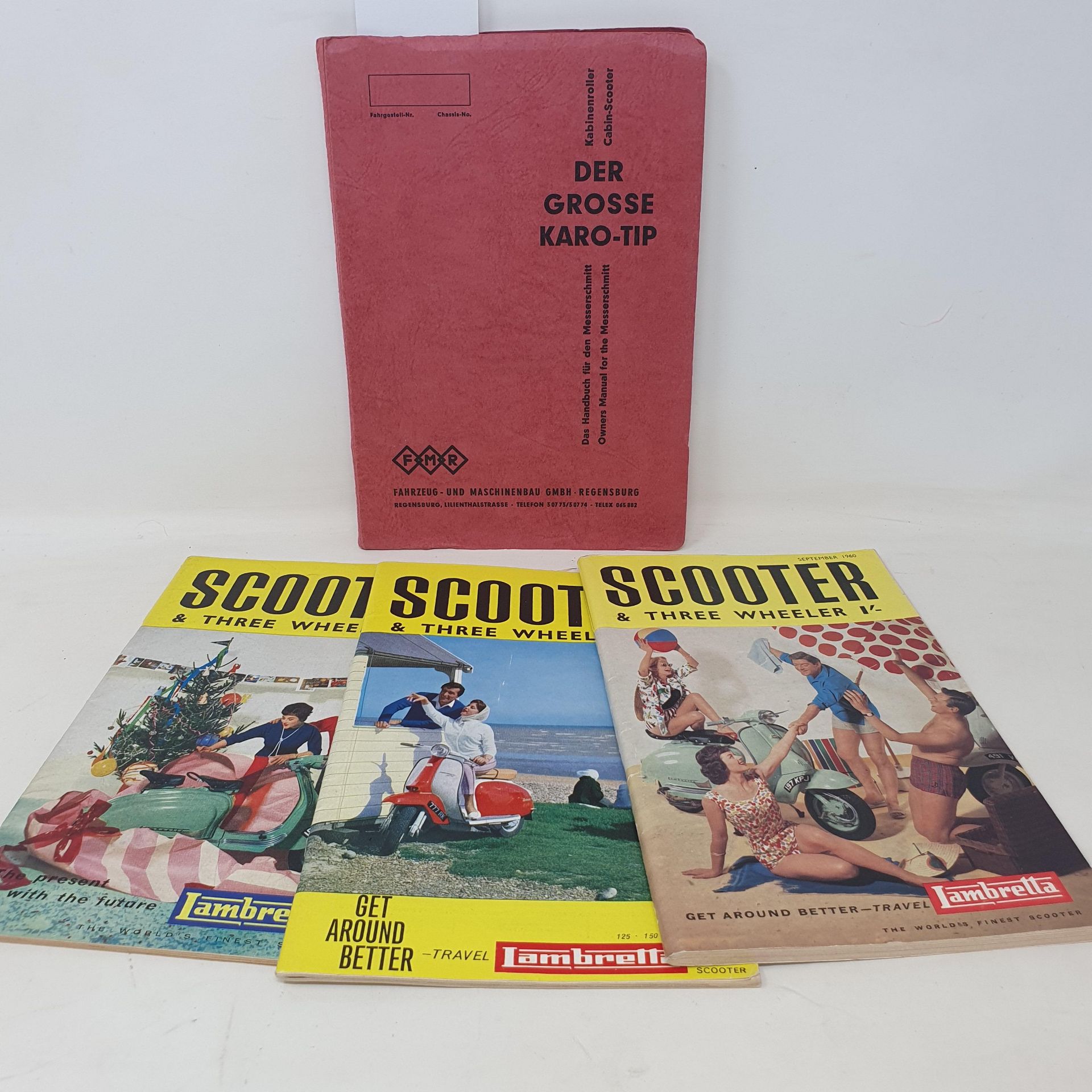 An original Messerschmitt KR200 owner's handbook and three scooter and three wheeler magazine,