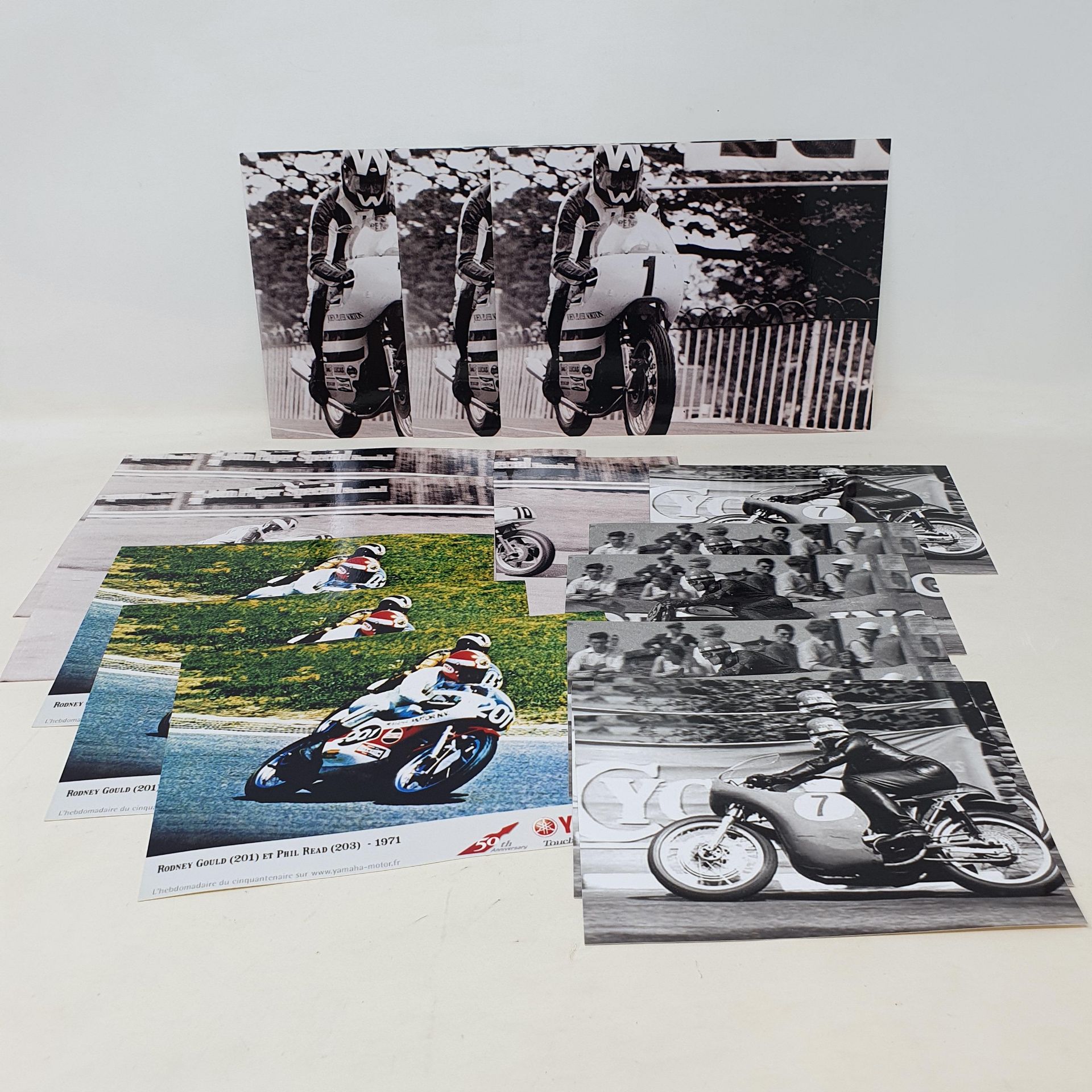 Assorted black and white photographs of racing motorcycles including Manx Norton and others (qty)