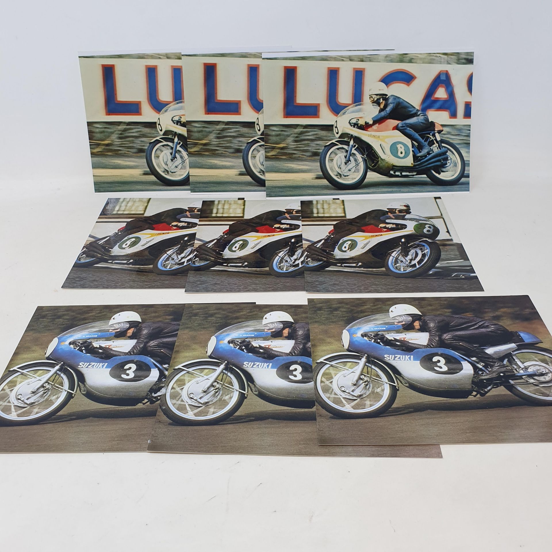 Of Bill Smith aboard various racing motorcycles, including the six cylinder Honda, all signed by