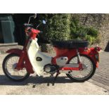 A 1974 Honda C50 Registration number UOT 61M V5C, red Totally restored about five years ago Many new