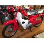 A 1975 Honda C70 Registration number UJT 69SFrame number