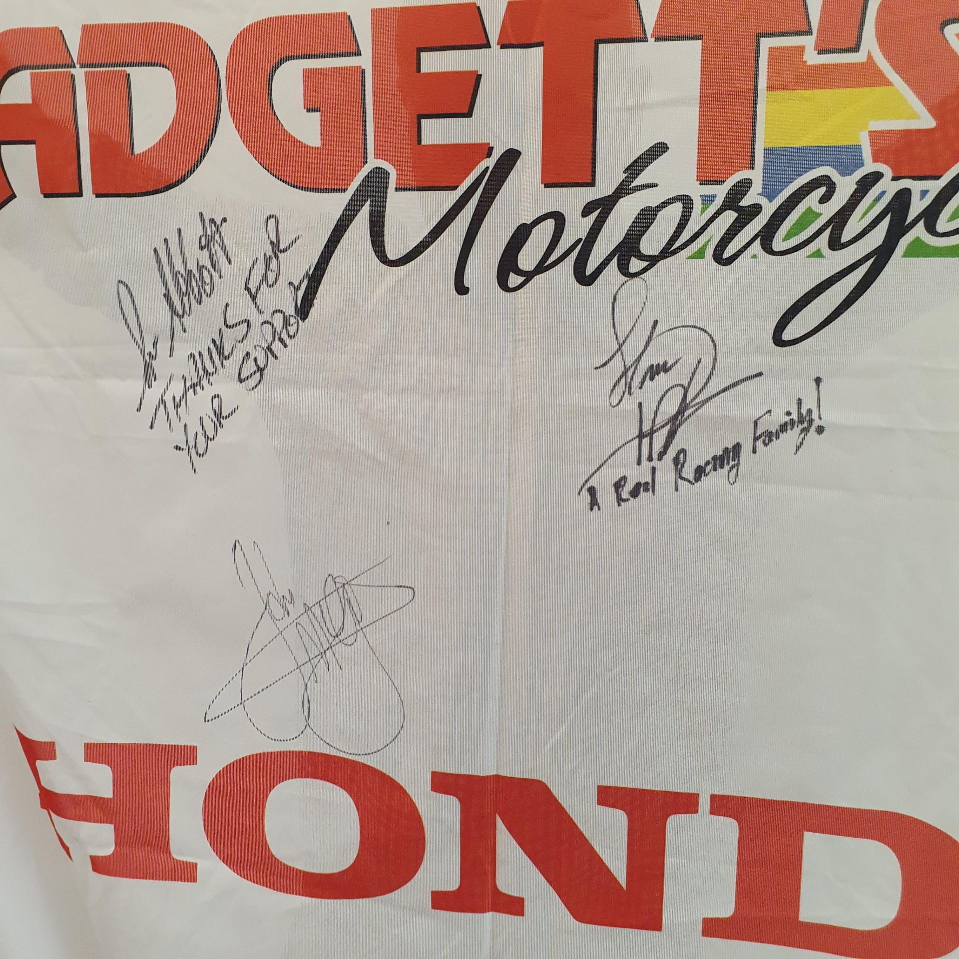 A PADGETT'S HONDA motorcycles banner, with various team signatures including John McGuinness and Ian - Image 2 of 2