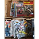 A large quantity of Isle of Man TT Manx Grand Prix official race programmes from the '80's, '90's