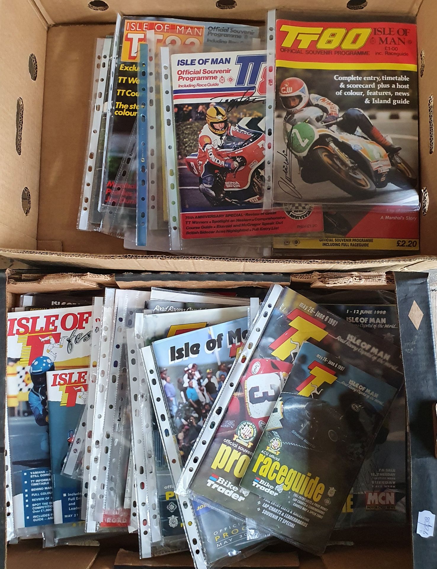 A large quantity of Isle of Man TT Manx Grand Prix official race programmes from the '80's, '90's