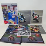 Assorted motorcycle racing colour photographs, including Valentino Rossi, Stan Woods, and others (