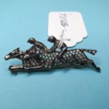 A 9ct gold, silver, diamond and opal jockey brooch