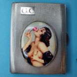 A silver cigarette case, initialled, later applied a plaque decorated a saucy lady Report by RB