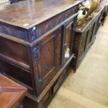 An oak cupboard, top with two doors, base with single cupboard door, made from antique parts, 88