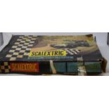 A Triang Scalextric outfit No.31, a Scalextric track, slot cars, and accessories. (qty) Very