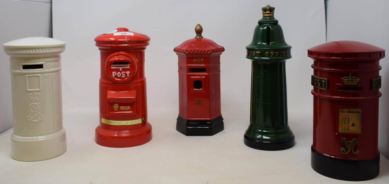 A Honiton pottery novelty money box in the form of a letter box, and other novelty letter boxes (