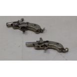 A pair of miniature watch fob Derringer pistols, 3.5 cm