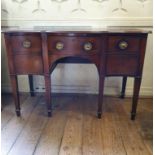 An early 19th century mahogany serpentine front sideboard, on tapering square legs, 139 cm wide