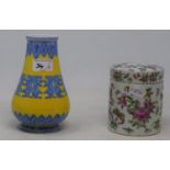 A Canton jar and cover, 12 cm high, and a Chinese yellow ground porcelain vase, 18 cm high (2) See