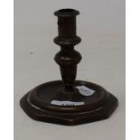 An 18th century style candlestick, on an octagonal base, 12 cm high