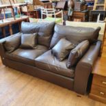 A brown leather Collins and Hayes sofa, 203 cm wide