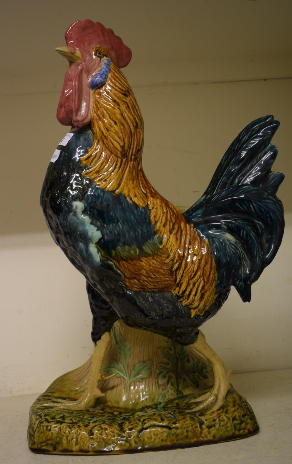 A French stoneware cockerel, 62 cm high Does not sit level, various chips to edges most notable on