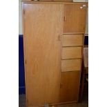 An oak wardrobe, bureau, pine corner cabinet, towel rail, coffee table, pair of bedside cabinets,