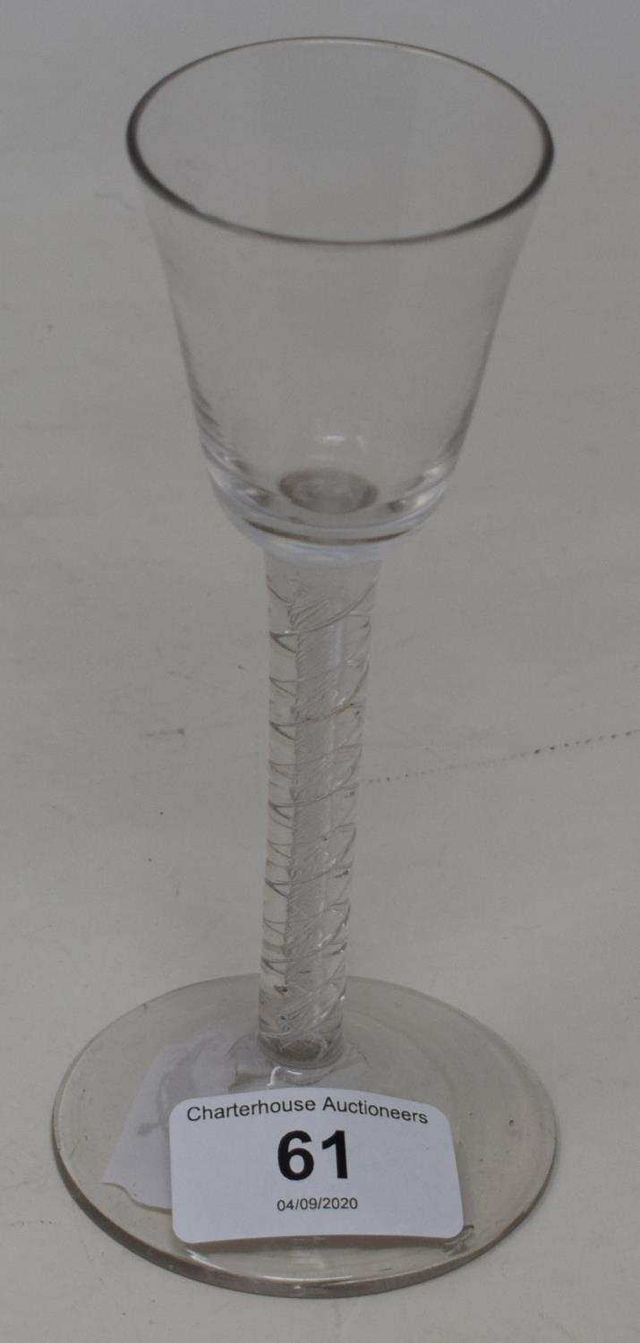 An 18th century wine glass with air twist stem, 15 cm high