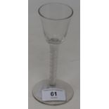 An 18th century wine glass with air twist stem, 15 cm high