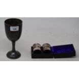 A George V silver goblet, London 1946, and a set of four silver napkin rings, 6.5 ozt