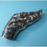 A silver boar head cane handle