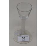 An 18th century wine glass with opaque air twist stem, 12 cm high
