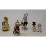 An 19th century Dresden figure of an artist, 12 cm high, and other 19th century and later figures (