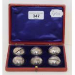 A set of six Edward VII silver novelty menu holders, in the form of golf balls, Birmingham 1905,