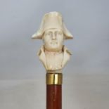 A 19th century malacca walking stick with carved ivory handle in the form of Napoleon, 90 cm