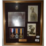 A 1914-15 trio, awarded to M2-105883 Pte P Leedam ASC, framed with a badge and three monochrome