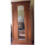 A Victorian mahogany wardrobe, with a mirrored door, 114 cm wide Report by RB A little faded, with a