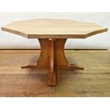 A Derek Lizardman Slater octagonal dining table top having adzed decoration, 138 cm wide Top loss of