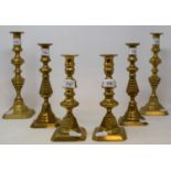 Three pairs of 19th century brass candlesticks, tallest 30 cm high