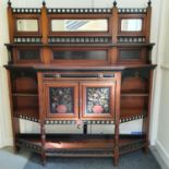 A late 19th century Aesthetic Movement walnut, ebonised and painted side cabinet, the raised back