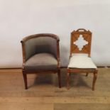 An early 20th century mahogany tub chair, and a 19th century single (2)