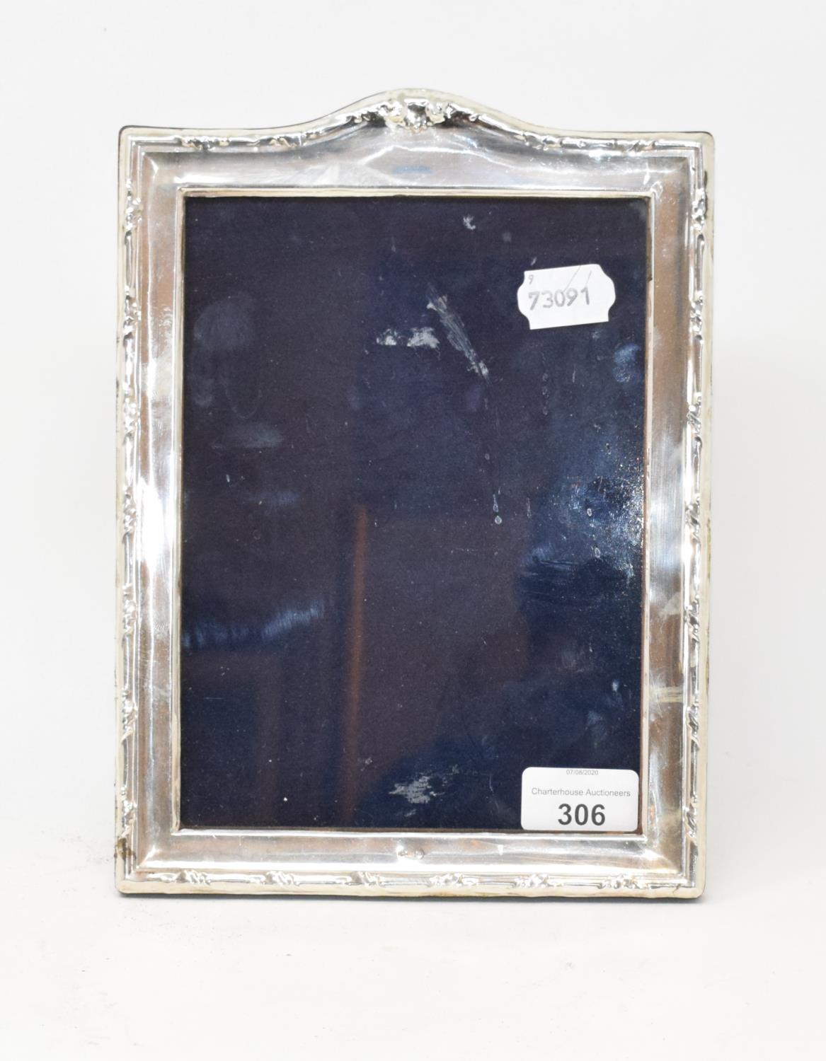 A silver mounted photograph frame, 26 x 19.5 cm Report by RB Modern