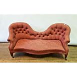 A 19th century button back sofa, on mahogany legs, 150 cm wide