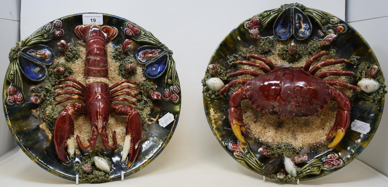 A pair of early 20th century Pallisy plates, one decorated with a lobster, the other with a crab,